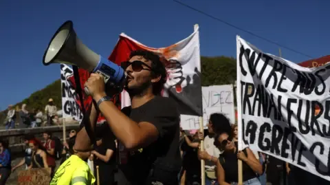 Nationwide Strikes Begin Against Spending Cuts
